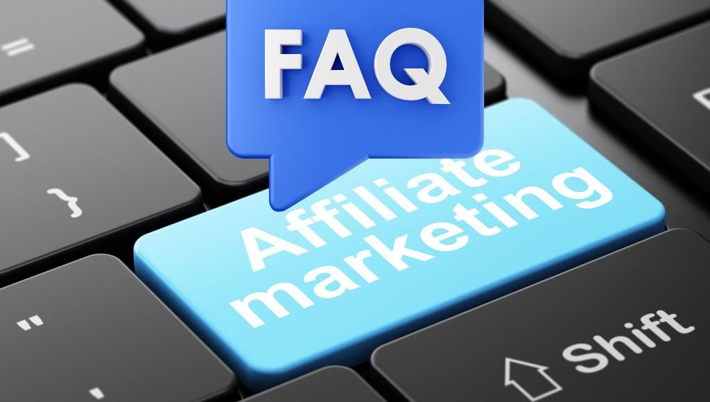 Keyboard with a blue “Affiliate marketing” key and an FAQ speech bubble hovering above, representing digital marketing questions and answers.